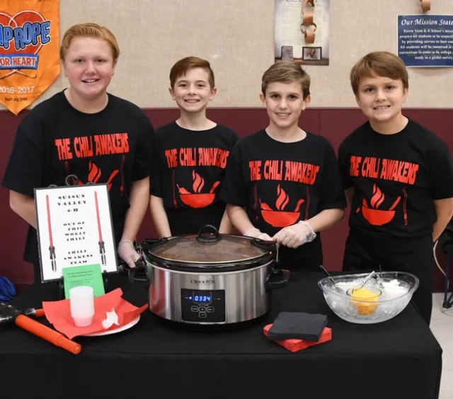 The Chili Awakens Team from the Suisun Valley 4-H Club (from left) Brody Westad, James LJ George, Markus Taliaferro and Beau Westad, served