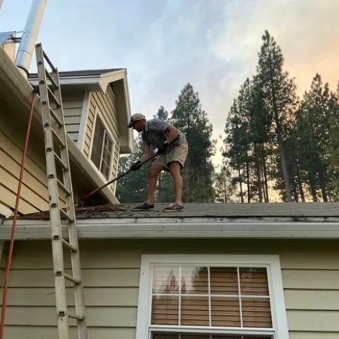 Don't forget to clean your roofs and gutters of any moss, vegetative debris, or leaf litter. Here the author wishes he did this in May rather than waiting until August with wildfire smoke looming in the background.