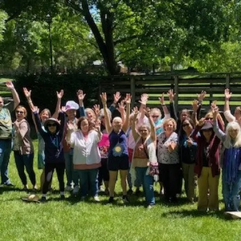 people with their hands in the air