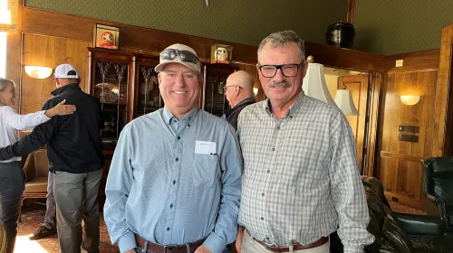 Steve Fennimore, right, stands next to grower Mark Mason